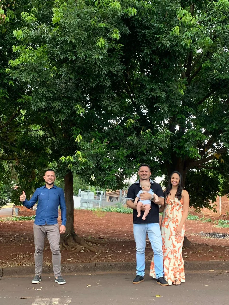 Família contemplada com imóvel